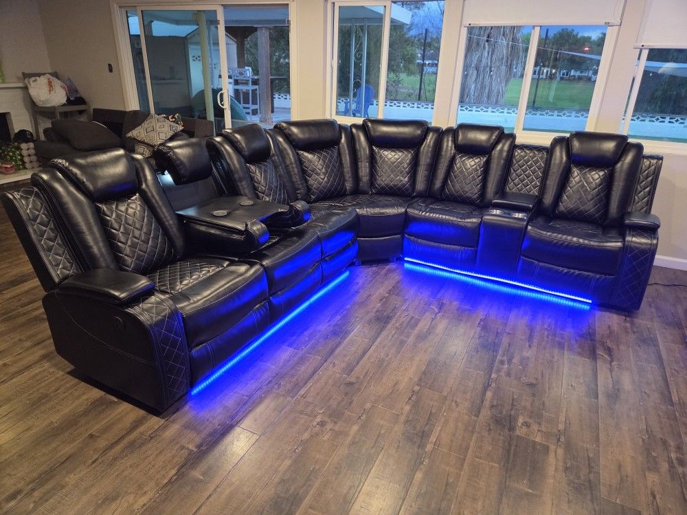 Gourges Sectional Black Faux Leather W/ LeD Light, Wireless Charger, Cup Holder & Storage Console 2 Power Recliners $1599 Add Chair $399