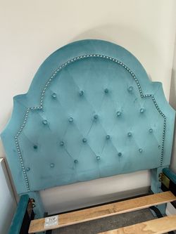 Teal Velvet Tufted Upholstered bedframe and chandelier