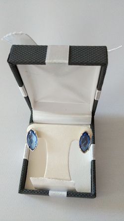 Silver earrings with blue stone