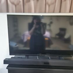 TV and Sound Bar and Speaker