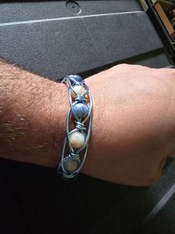 Anodized aluminum and copper gemstone bracelets