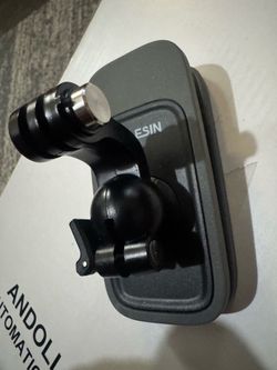 Backpack clip and magnetic action camera holder