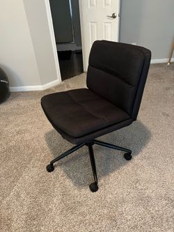 Swivel armless chair