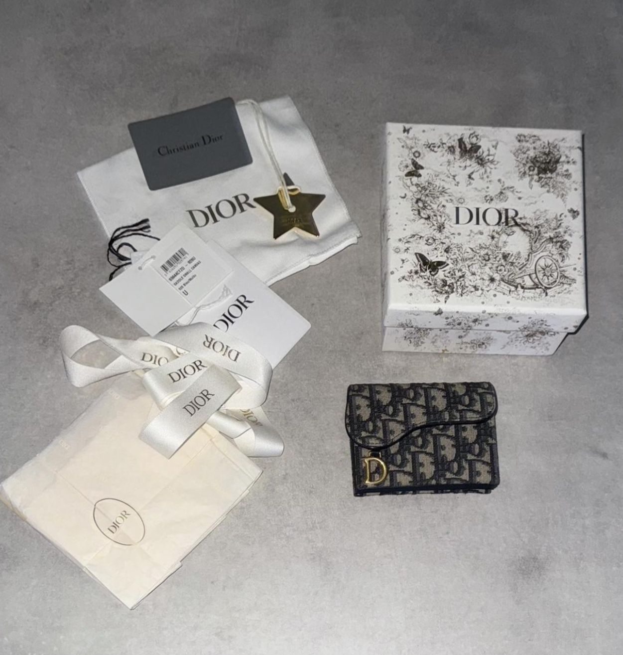 Dior saddle wallet