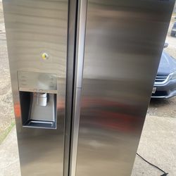 Samsung side by side refrigerator and freezer