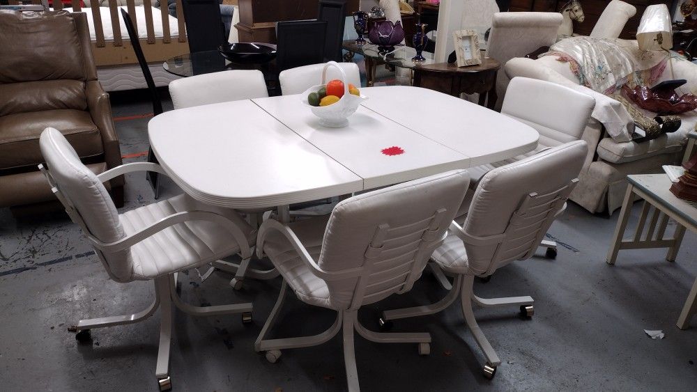 Nice White Table w/ Leaf and Six Rolling Chairs for sale 🍽️

