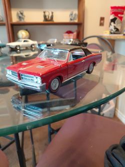 1964 GTO convertible red with black Franklin Mint $100