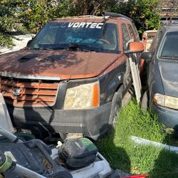06/02 Dodge Ram Cadillac Escalade 