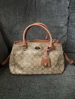 Coach purse with side straps