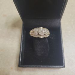 10 K Gold Diamond Ring.  Weight Is 3.4 Grams