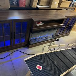 New,98”TV stand with fireplace ( scratches at the back