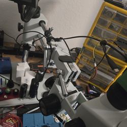 AmScope SM-4TPZ Professional Trinocular Stereo Zoom Microscope and DC Power suplly.