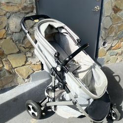 Silver and white Baby stroller/kinder King