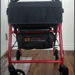 RHYTHM MEDICAL ADULT WALKER. BURGANDY, SEAT WITH BACKREST, FRONT POUCH, UNDER SEAT STORAGE, DUAL BRAKES, ADJUSTABLE. EXCELLENT CONDITION!