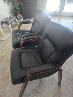 2 leather movie chairs