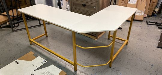 Gold and white L-shaped desk