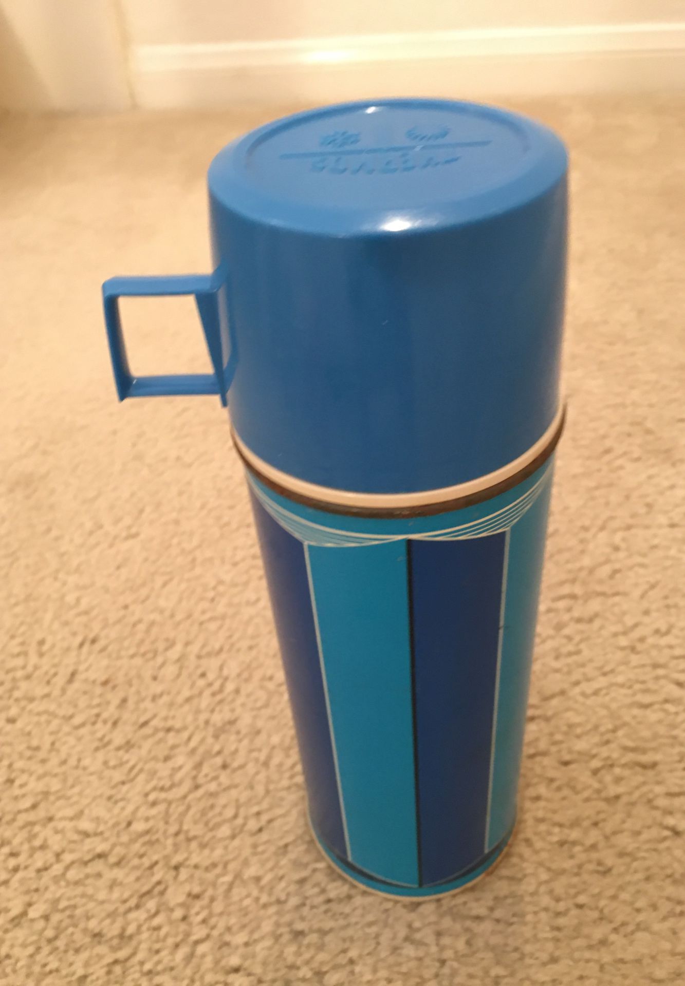 Thermos with glass liner and cup top antique