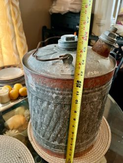 Vintage galvanized metal gasoline can