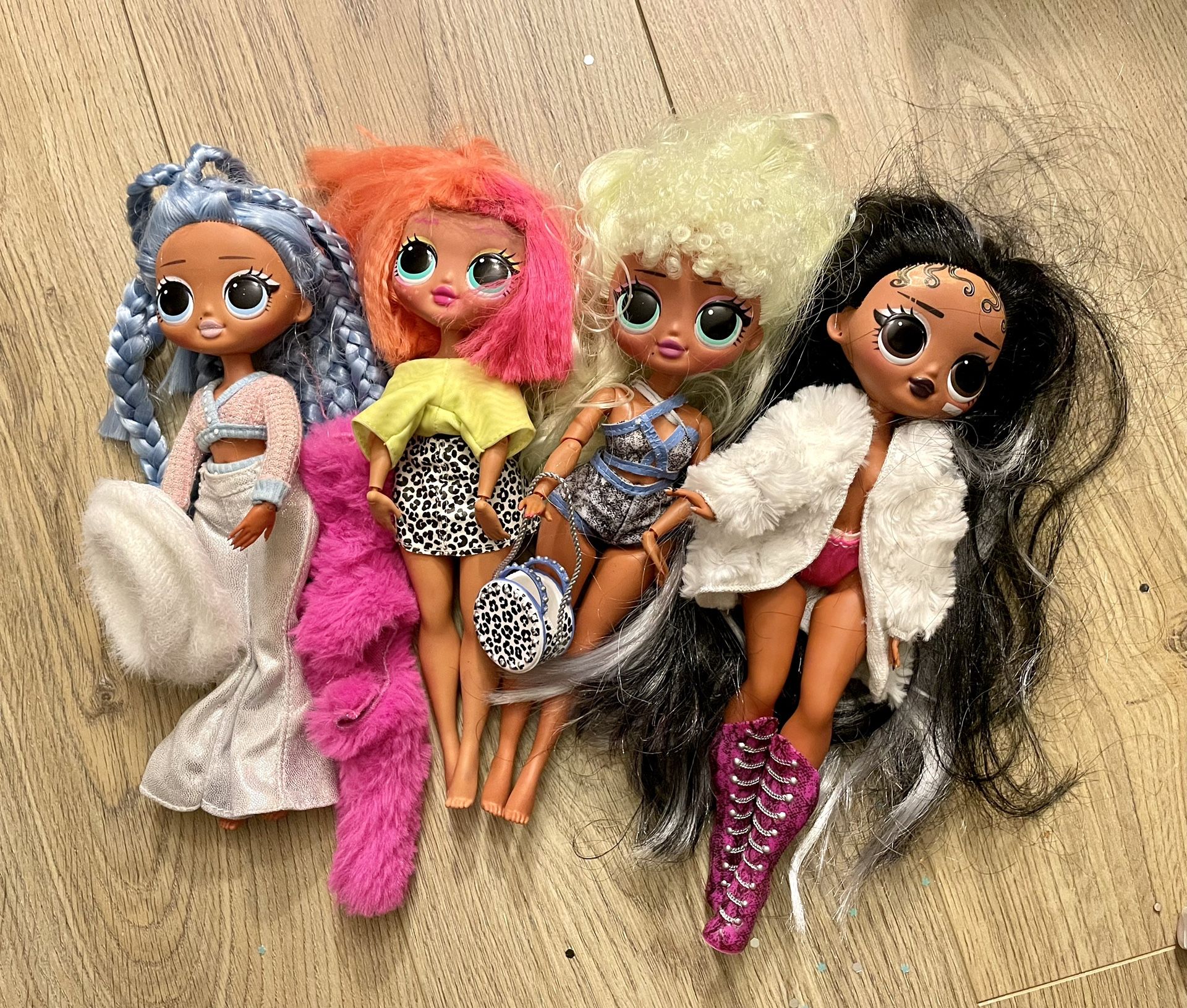 4 OMG Lol Dolls With Accessories