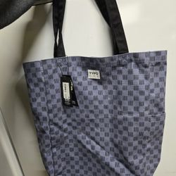 BRAND NEW WITH TAGS TYPO BAG NO FLAWS NEVER USED BRAND NEW SEE ALL PICS