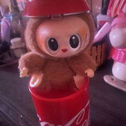Labubu in coke bottle