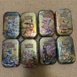 prismatic evolution tins