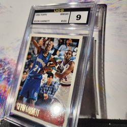 This image features a collectible basketball card, specifically the 1996 Topps #131 Kevin Garnett card. 
This is considered his "Year 2" card, followi