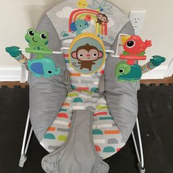 Bright Starts Playful Paradise Vibrating Baby Bouncer with Toys