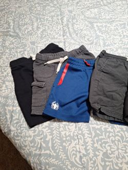 6 pair of 4t boys shorts and 3 shirts one size 4t the others are size 5 all For 8 dollars