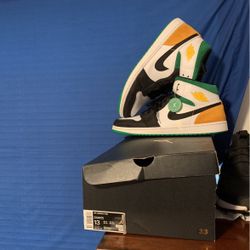 Jordan 1 Mid Oakland