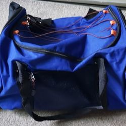 Rolling Multi-Pocketed Duffle/Carryon Handbag/Luggage
