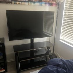 TCL-ROKU TV & TV STAND 