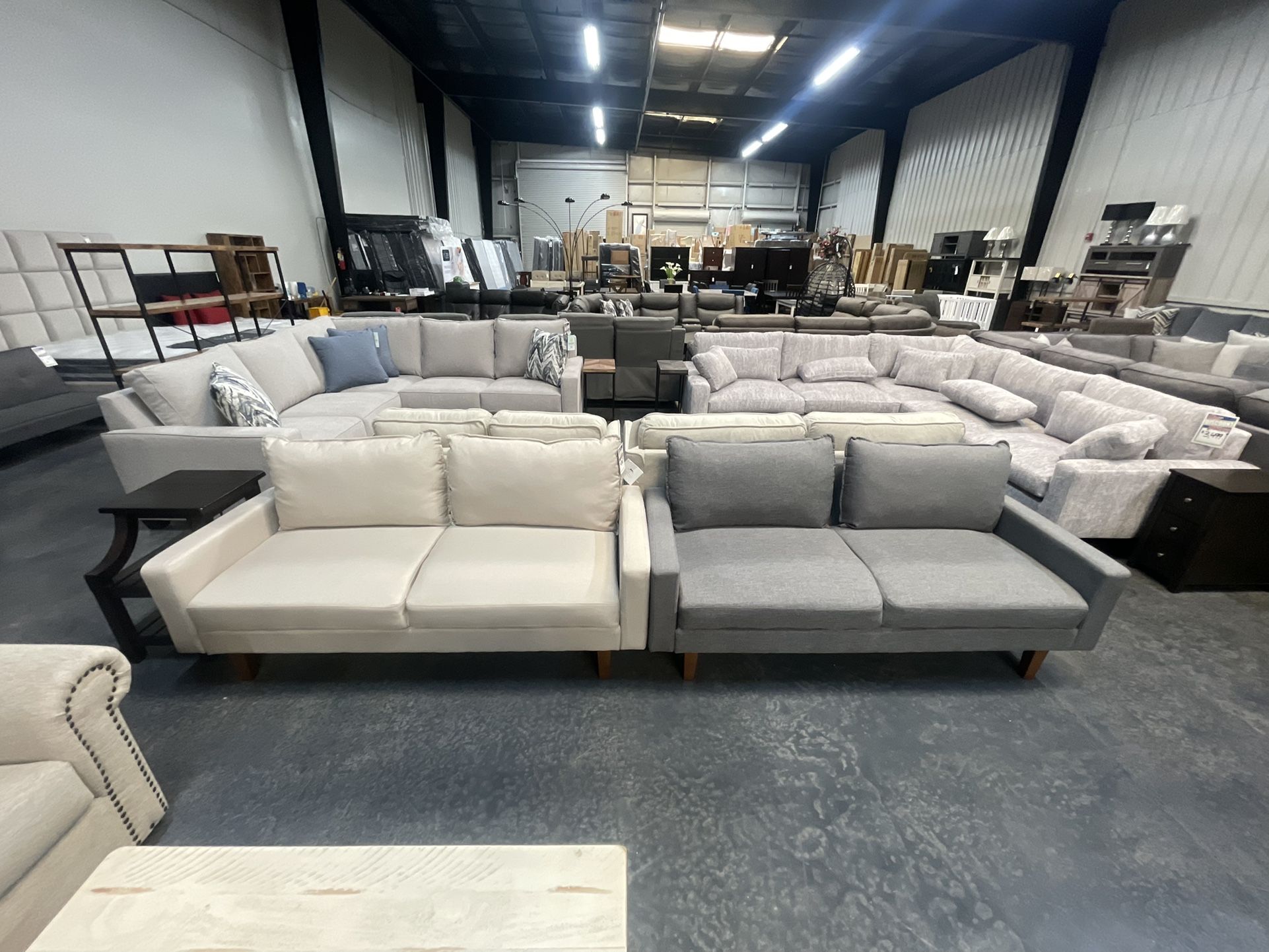 Small Loveseat Available In Grey Or Beige