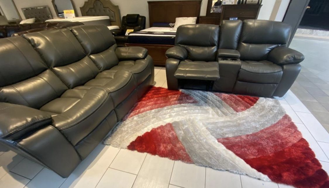 Holiday sale. Madrid, gray leather reclining sofa and loveseat set only $1299. Easy finance option. Same day delivery.