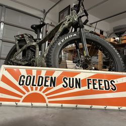 Golden Sun Feeds Metal Advertising Sign. 42 Inches Long X 12” Tall