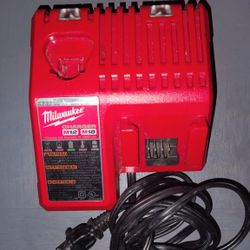 Milwaukee Dual Battery Charger And Drill .
