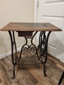 Antique treadle table base