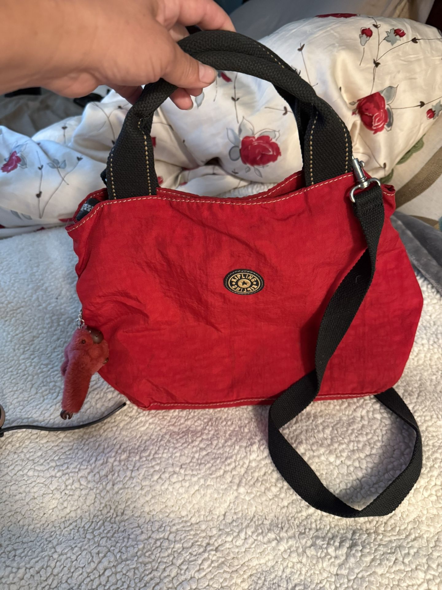 Kipling Red Messenger crossbody Bag with Adjustable Straps and Sporty Design