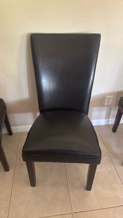 Two Faux Leather Chairs