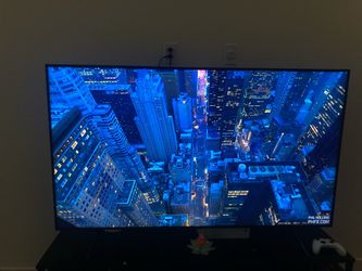 65” inch Samsung Qled 4k TV with sound bar and Wooden TV unit