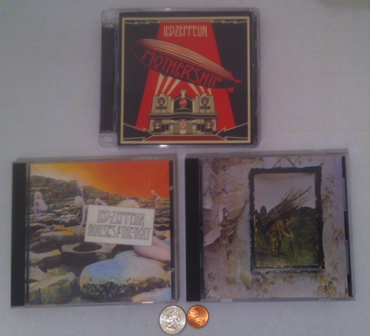 3 Really Nice Led Zeppelin Music CDs, Collection, Nice and Put Away, Good. 1. Led Zeppelin Mothership. 2. Led Zeppelin Houses of the Holy. 3. Led