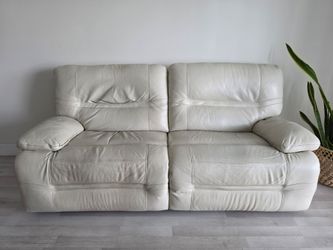 Leather Sofa For Sale. Has 2 Recliners. Color Light Beige.