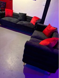 Black velvet sofa