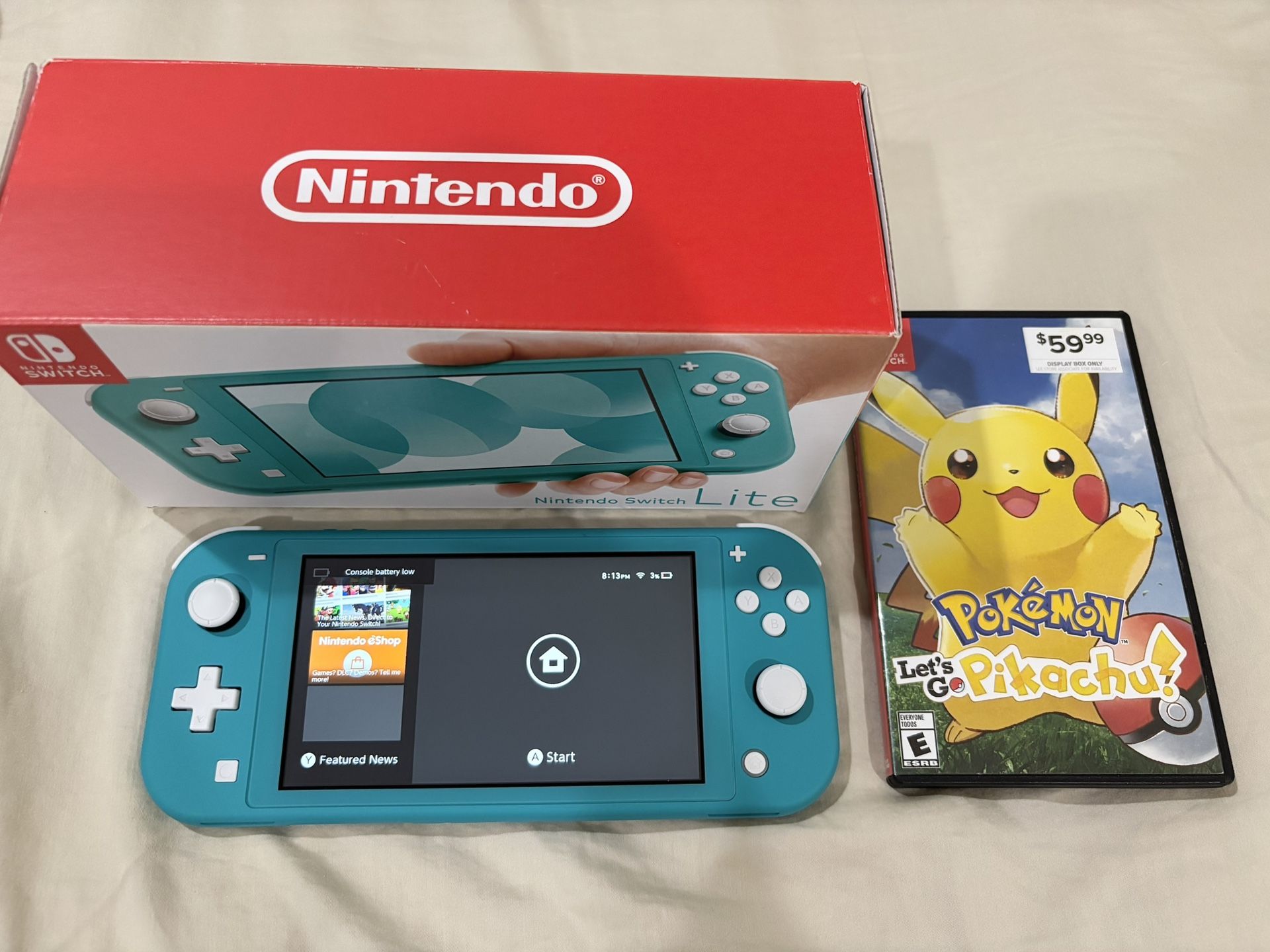 Nintendo Switch Lite Turquoise + Pokemon Let's Go Pikachu