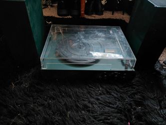 Record player with speakers and records