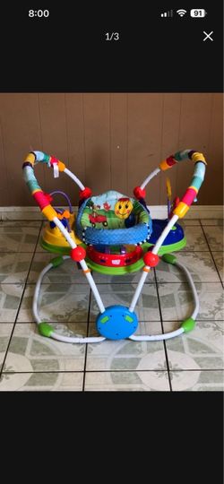 LIKE NEW EINSTEIN BABY ACTIVITY JUMPER MUSIC LIGHTS AND SONGS WORKS!!!!