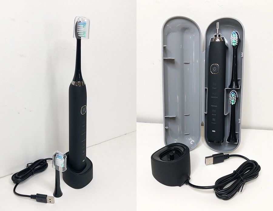 (New in box) $20 Portable Electric Toothbrush Rechargeable Includes 2 Clean Brush Heads