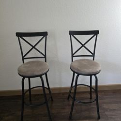 2 swivel chairs