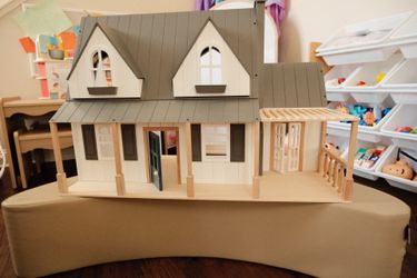 Doll house with camper