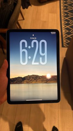 iPad Air 5th Gen 64gb wifi. Comes with Apple Smart Folio case!